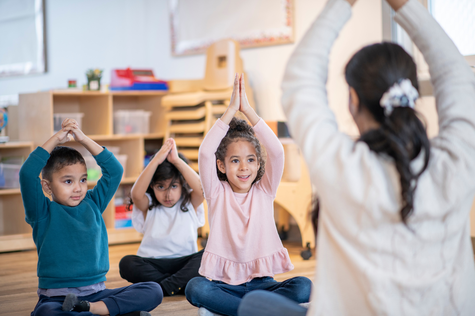 Daycare Children Doing Yoga stock photo